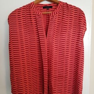 Bright orange blouse